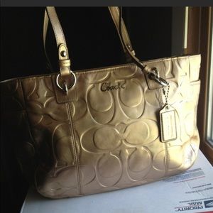 Coach metallic gold signature embossed leather